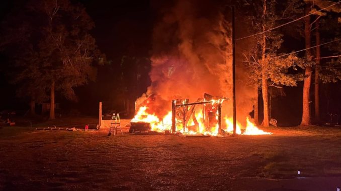 Blahut Road shop goes up in flames, owner woken by neighbor