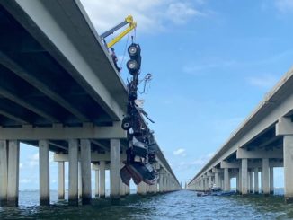 Driver of 18-wheeler rescued from water after tanker overturned on I-10 Twin Span Bridge towards New Orleans