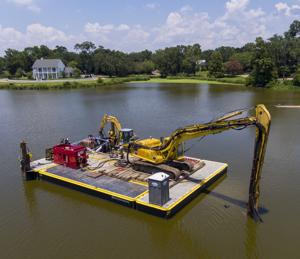 University Lakes restoration finally underway as project managers battle algae, sediment