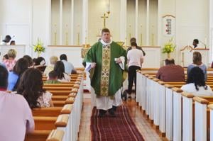 ‘Father Ashley’ bids Zachary, St. Patrick’s Church farewell