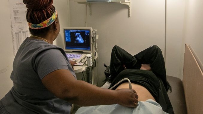 Louisiana abortion ban reinstated, clinics halt procedures