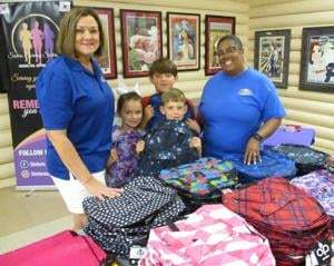 Ponchatoula Kiwanis, Sister Serving Sisters  distributes school supplies just in time for new semester