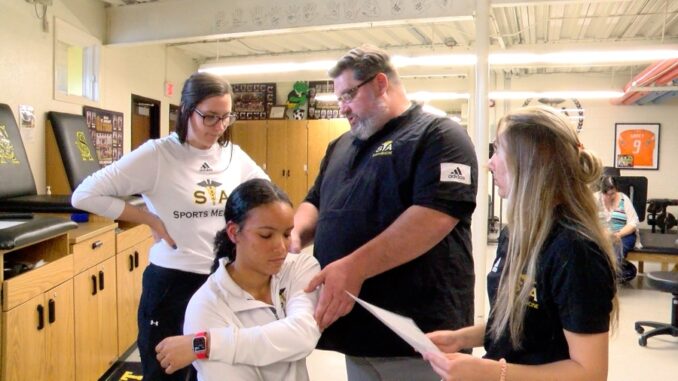 St. Amant shares value of athletic trainers in high schools