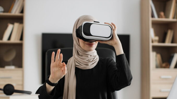 A woman wearing VR googles - Source UNWTO