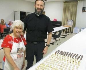 Volunteer prepare thousands cookies, other treats for the Denham Springs St. Joseph's Altar
