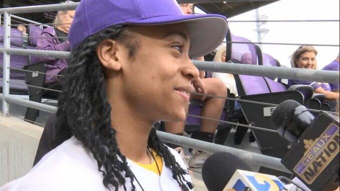LSU women's basketball champion Alexis Morris throws first pitch at baseball game Tuesday night