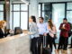 A lineup at a hotel reception desk - Source Skyware Hospitality Solutions