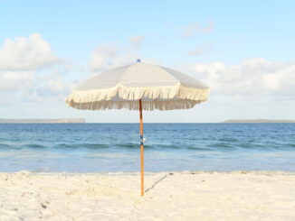 Umbrella on a beach - Unsplash