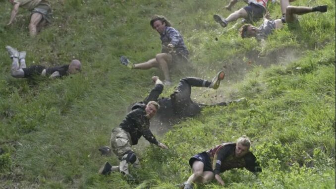 Contestants chase cheese wheel down a hill in chaotic UK race