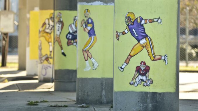 Expanding interstate threatens fate of Barbier's LSU football player painting at Dalrymple
