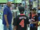Former LSU pitcher surprises young athletes with shopping spree