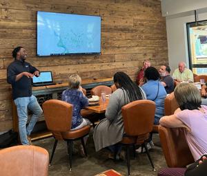 Zachary planning director demonstrates GIS mapping tools to Zachary Rotary Club