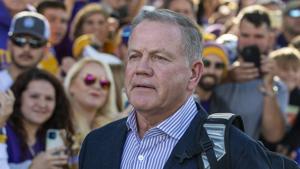 LSU's Brian Kelly shows he's in on the joke when asked how his accent is coming along