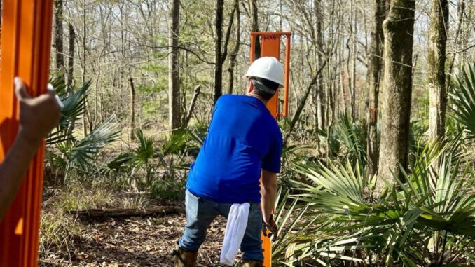 Rotary Club of Greater Ascension erects trail markers at Amite River Wildlife Sanctuary